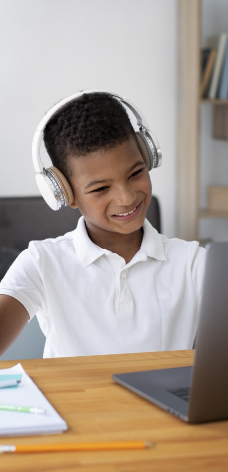 we-believe image Student learning with headphones
